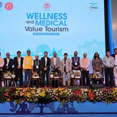 Our CEO, Dr. Mruthyunjay, speaking at a panel discussion on the future of wellness and medical tourism. We are actively involved in shaping the global conversation around holistic health.
