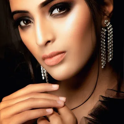 A classic example of my beauty work, focusing on a dramatic smokey eye and glowing skin. I use specific lighting techniques to ensure the makeup details and the texture of the skin are captured with perfect clarity for campaign use.