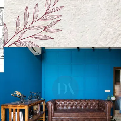 A visual representation of our design process, showing a finished living room with a bold blue wall next to a textured background with a sketch element. It's a glimpse of how ideas become reality.