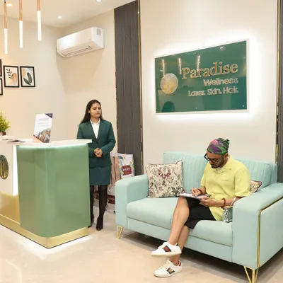 The reception and waiting area at our clinic. We've created a serene and chic environment where you can relax before your appointment with one of our expert dermatologists.