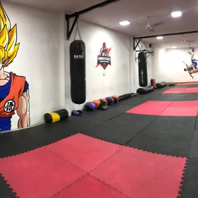 Welcome to our dojo. With dedicated space for striking and grappling, and murals that inspire the warrior spirit, this is where you will work, sweat, and become unbeatable.