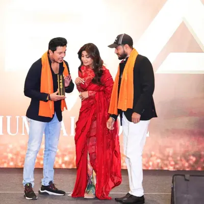 Receiving the Global Business Award for 'Best Yoga Center' from Shilpa Shetty. Success is the result of hard work, perseverance, and love for what you do.