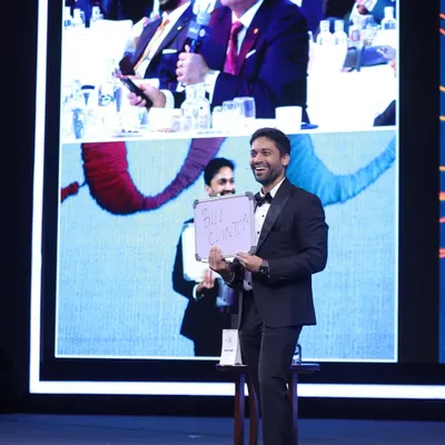 The big reveal during a mind-reading act for the leaders at Taj Hotels. You can see the audience's reaction on the top screen as I show that I knew the name they were thinking of. It’s a powerful moment that connects with the entire room.