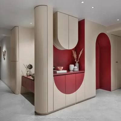 This integrated unit was my solution for a passage area, hiding a washing machine, crockery, and shoe storage behind a beautiful, wave-inspired facade. It proves utility can be a work of art.