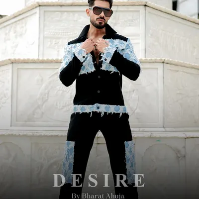 This is power dressing redefined. I created this two-piece set by blending a luxe black base with distressed denim patchwork for a look that is rugged, tailored, and unapologetically modern.