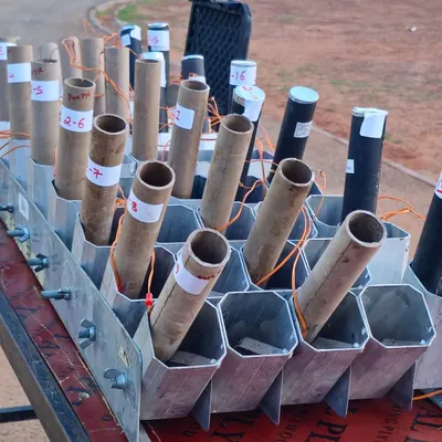 The setup for a spectacular firework show. We carefully arrange and wire each shot to create a synchronized and breathtaking display for grand entrances or finales.