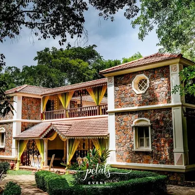 The beautiful heritage venue, Angana the Courtyard, is transformed into a floral wonderland with radiant marigolds and graceful yellow fabric drapings.