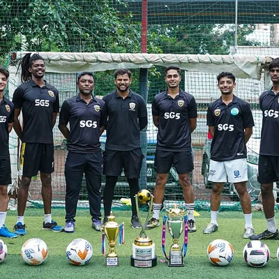 Our team of dedicated coaches with the trophies our academy has won. We empower minds to shape the future of football.