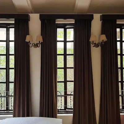A glimpse of a grand project in progress. These tall, classic French windows are just the beginning of a beautiful Indian classical design coming to life.