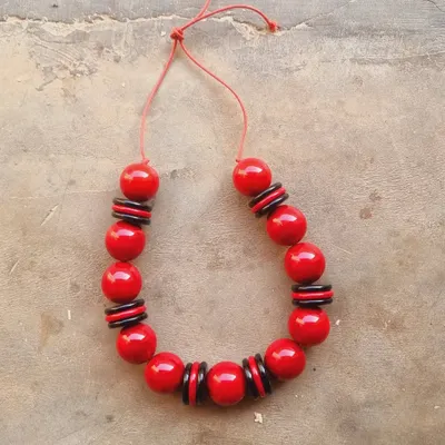 A glimpse of our new range of chunky Channapatna jewelry, perfect for the festive season. This beautiful red and black beaded necklace was created by Pallavi and her team of artisans, showcasing their incredible skill.