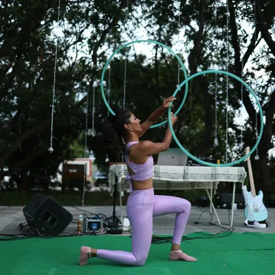 Performing with twin hoops at Zenfest in Hyderabad. I love the challenge and symmetry of working with two hoops at once. This was part of an interactive session where I got the audience to jump and move with me.