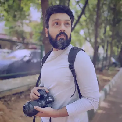 Me and my camera, my favorite conversation partners. This is me in my natural habitat, always looking for the next shot.