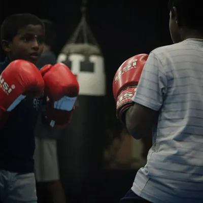Two of our youngest boxers squaring off. They learn respect and control while developing their fundamental boxing skills.