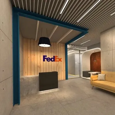 The reception area we designed for FedEx, which rethinks the conventional corporate entrance. We used a combination of raw concrete, warm wood paneling, and bold brand colors to create a modern and welcoming first impression.