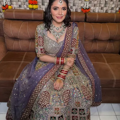 One of my beautiful brides on her wedding day. She looks absolutely radiant in her purple lehenga, and I was so happy to help her find the perfect layered necklace set to complete her look.