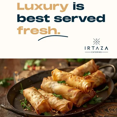 Freshly made spring rolls, perfectly crispy and served on a rustic platter. This is a classic appetizer that I ensure is always served hot and fresh for the best taste.