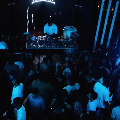 A wide shot of the packed floor at Flo Church Street. The blue lighting and energetic crowd capture the electric atmosphere of my Saturday night sets.