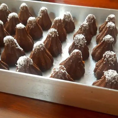 A modern twist on a classic, these are my chocolate modaks prepared for Ganesh Chaturthi. They have a rich, fudgy texture and are a huge hit with both kids and adults.