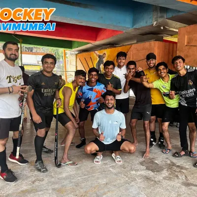 A proud moment with the team after a Sunday training session. The smiles and thumbs-up show the strong bond we share.