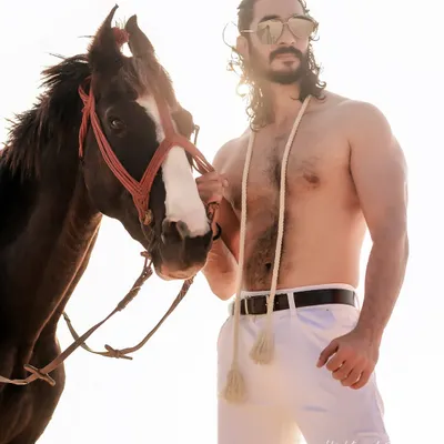 An extensive editorial series of a male model with a horse on the beach. I used a mix of color and black and white, along with varied poses, to create a powerful narrative of untamed strength and freedom.