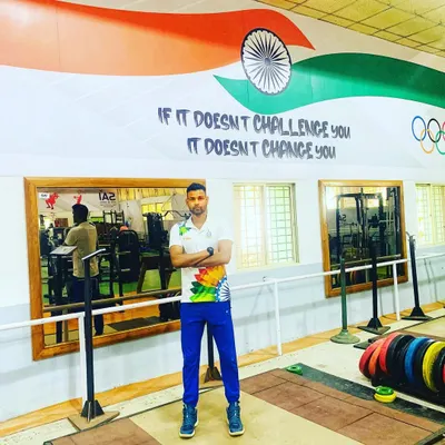 Standing in the gym at SAI Bangalore. The quote on the wall says it all: "If it doesn't challenge you, it doesn't change you." This is the philosophy we live by, both in the gym and on the court.
