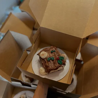 My Bûche de Noël, or Yule log cake, all boxed up and ready for a Christmas celebration.