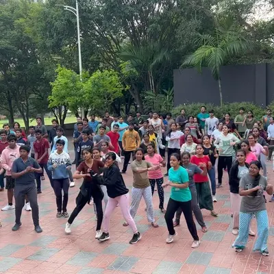 The entire group of students at Atria Institute of Technology fully engaged in an early morning dance session. This shows how I can manage and motivate very large crowds to participate together.