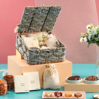 Experience the beauty of sustainable luxury with our handcrafted jute hamper. This intricately woven box, filled with gourmet selections, demonstrates that eco-friendly gifting can be both elegant and memorable.
