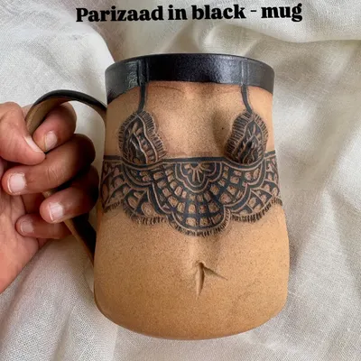 A closer look at the 'Parizaad' mug from my Déesse Collection, featuring detailed sgraffito carving in black. The form is designed to be comfortable to hold, making your daily coffee or tea a unique experience.
