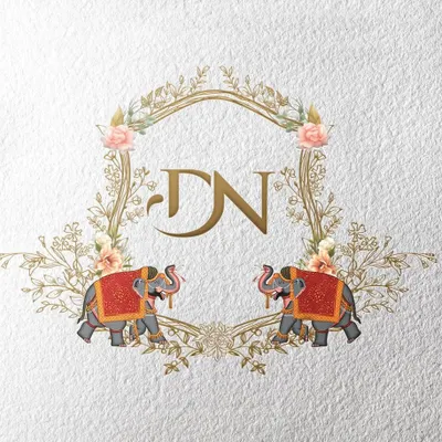 Let’s design a logo for your forever bond. This beautiful custom wedding monogram features the couple's initials, "DN," framed by florals and two decorated elephants, perfect for a traditional Indian wedding.