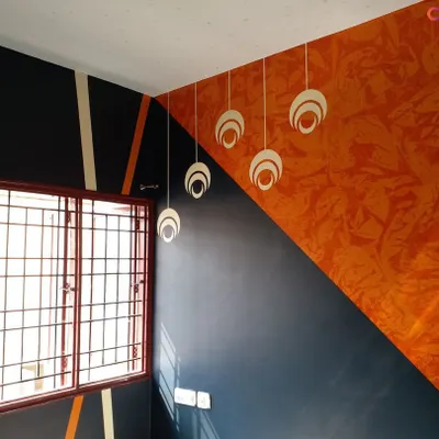This image showcases a variety of our recent projects, from intricate wall designs and textures to false ceiling and wallpaper installations. It's a great overview of the diverse services we offer to completely transform a home.