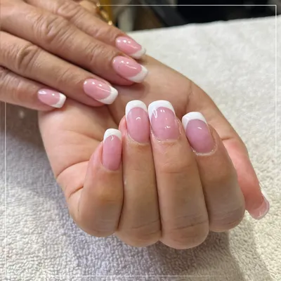 The classic French manicure is timeless for a reason. This clean, elegant look with perfectly shaped tips is one of my most requested styles for its sophisticated and polished finish.