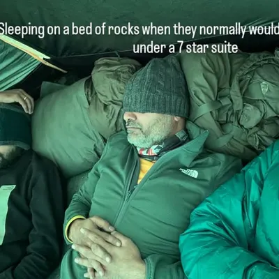 Sleeping on a bed of rocks when you're used to a 7-star suite. True friends are the ones who join you on your craziest whims, and this is what true mountain friendship looks like.
