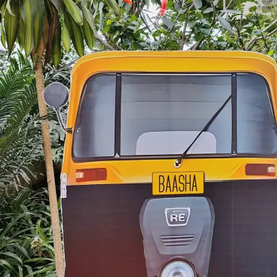 Naan oru dharava sonna, nooru dharava sonna madri! A custom auto rickshaw prop with 'Baasha' on the license plate for a superstar Rajinikanth themed party.