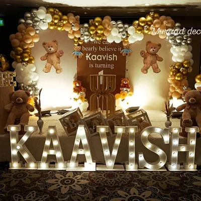 We can 'bearly' believe he's one. This adorable teddy bear themed first birthday features a full stage setup with marquee letters for the name, a custom backdrop, and lots of cute teddy bears.