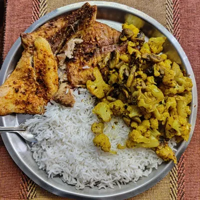 This is the basic framework of a solid meal. Air fried fish for protein and omega 3s, steamed rice for easily digestible carbs, and sauteed vegetables for vitamins and minerals.
