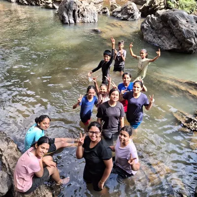Happy faces after a refreshing dip in a natural stream during our Adventure & Nature Awareness camp in Ulavi.