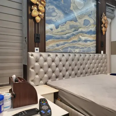 For this bedroom installation, the client wanted immersive sound without compromising on their interior design. I wall-mounted the rear speakers beside the tufted headboard, providing a clean, integrated look while delivering an enveloping audio experience for movies.