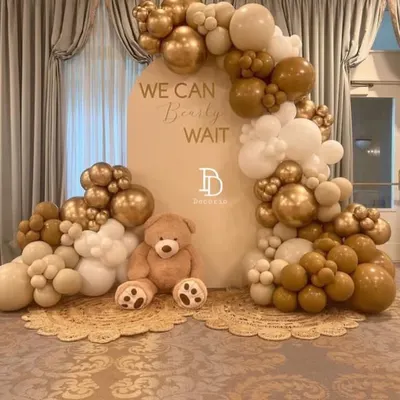 A full view of my elegant teddy bear baby shower setup. The neutral tones of beige, white, and gold create a timeless feel, and the large plush teddy bear makes for a sweet and cuddly centerpiece.