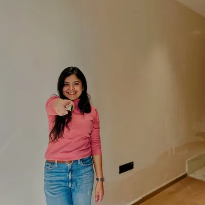 Every time I see a bare wall, I see a world of possibilities. This is the moment of excitement before the first stroke of paint.