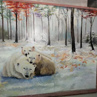 The finished two-panel mural of a polar bear family in a snowy, atmospheric forest. This piece showcases our ability to create large-scale nature scenes that evoke a specific mood and season.