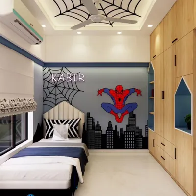 With great power comes a great bedroom. This Spiderman-themed room features a city skyline mural and a custom neon name sign for our little superhero.