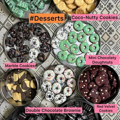 A dessert lover's dream! This platter showcases my wide range of eggless desserts, including Mini Chocolatey Doughnuts, Red Velvet Cookies, Marble Cookies, and Double Chocolate Brownies.