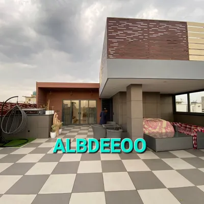 A fully realized rooftop project in Patel Nagar, featuring a prefabricated house with wood-finish cladding and an expansive, beautifully furnished terrace. This shows how I can deliver a complete, high-end living space on your roof.