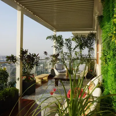 This is a full view of our Pioneer Araya project, showcasing a spacious terrace designed for luxury living. The covered pergola, vertical garden, and carefully selected plants create a private escape with an incredible city view.