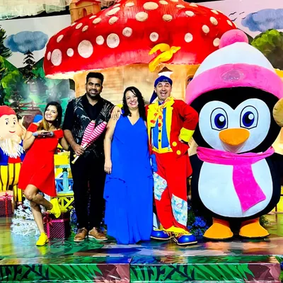 A colorful performance with our clown and penguin mascot posing with guests. We have a variety hub of characters to enhance your day.