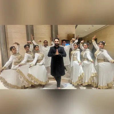 Your celebration, our stage. This is me with my incredible team of dancers. We dance to light up your special day and make memories with every movement.