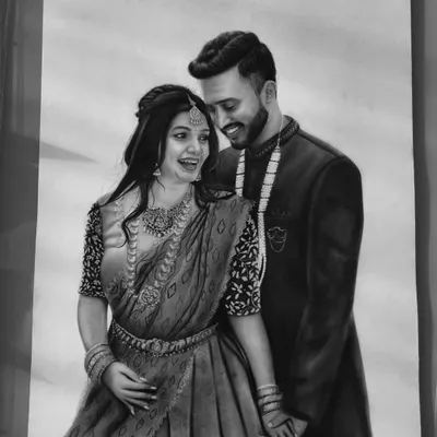 A finished A2 size wedding portrait, capturing the couple in a moment of candid joy. I spent over 27 hours on this piece, focusing on the intricate details of the bride's saree and jewelry.