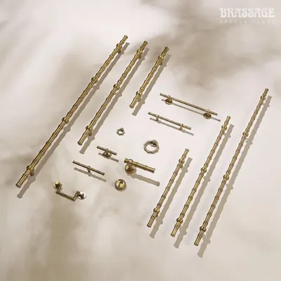 Our complete Bamboo Collection in an Antique Brass Matte finish. This image showcases the breadth of the collection, from long door pulls and cabinet handles to T-knobs and ring pulls, allowing you to infuse your home with the serene elegance of nature.
