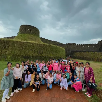 A group of students from Kanva Public School posing at the historic Mirjan Fort during their custom-designed educational trip to Gokarna.